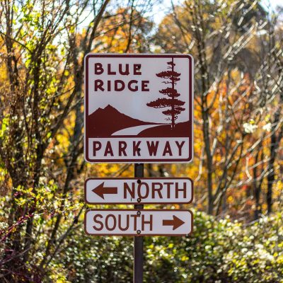 blue ridge parkway directional sign saying north and south