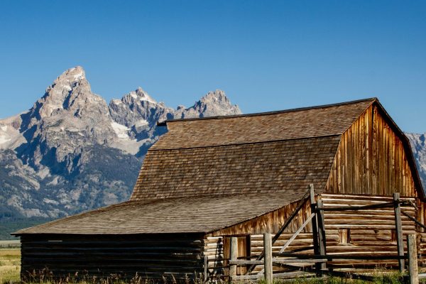 Historic T.A. Moulton Barn with breathtaking backdrop of Teton mountain range with snowtipped peaks