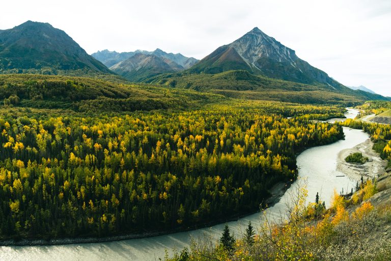 Remote river with mountains in background outside Palmer, Alaska