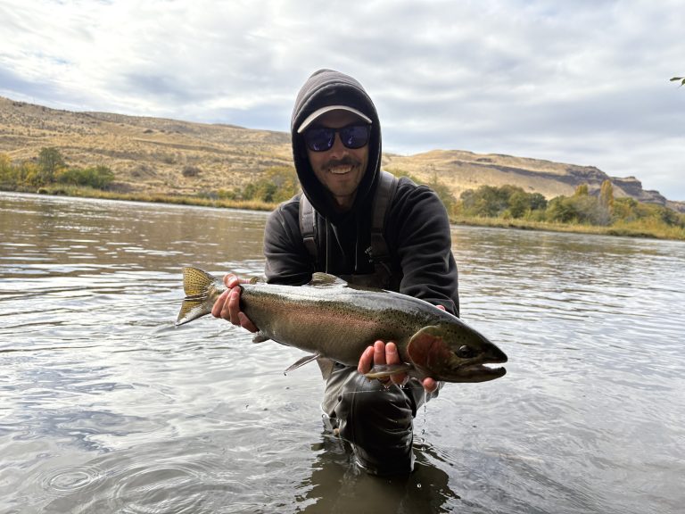fly fisherman fishing the Deschutes River in Oregon for steelhead